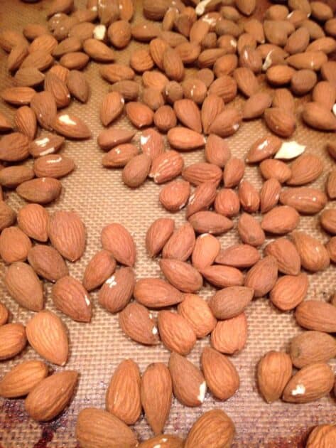 Almonds on a baking sheet.