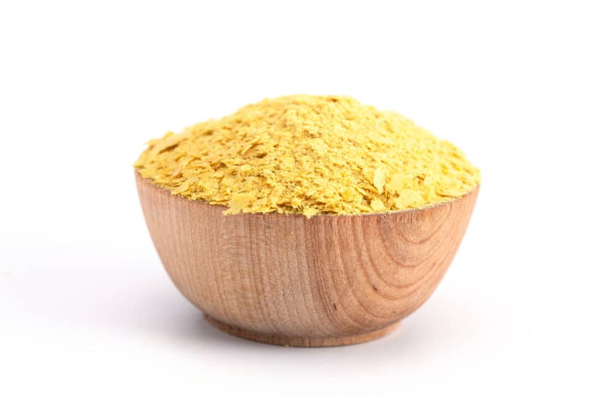 Photo of nutritional yeast in a bowl.