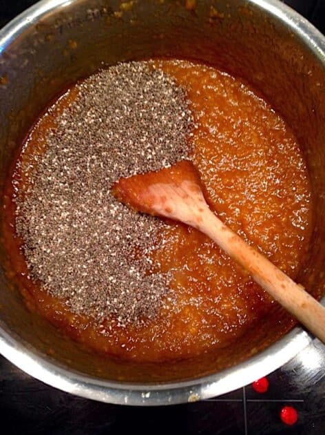 Blended dried apricots in a pot with chia seeds.