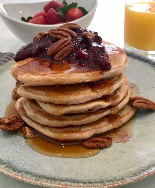 Stack of vegan pancakes on a plate.