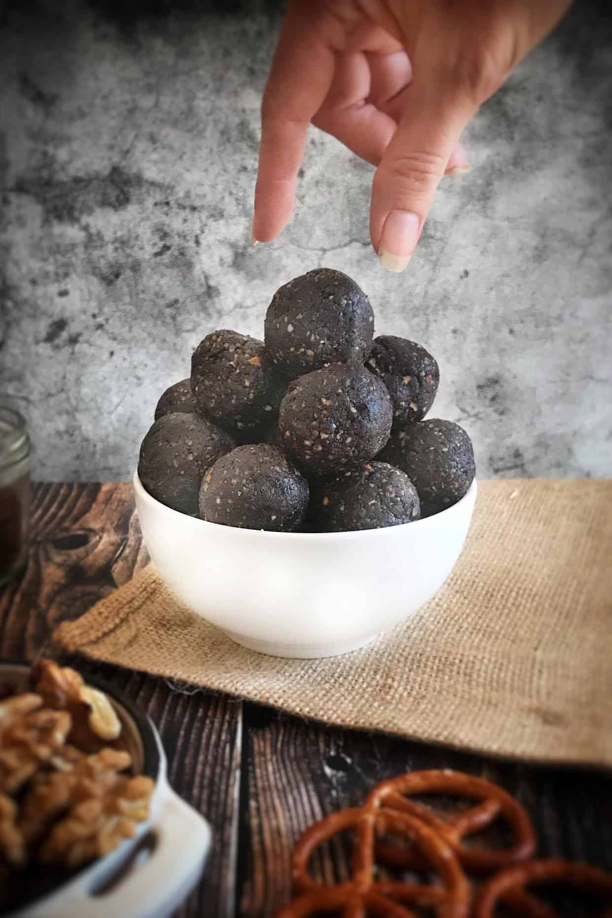 Bowl of vegan no-bake pretzel brownie bites.