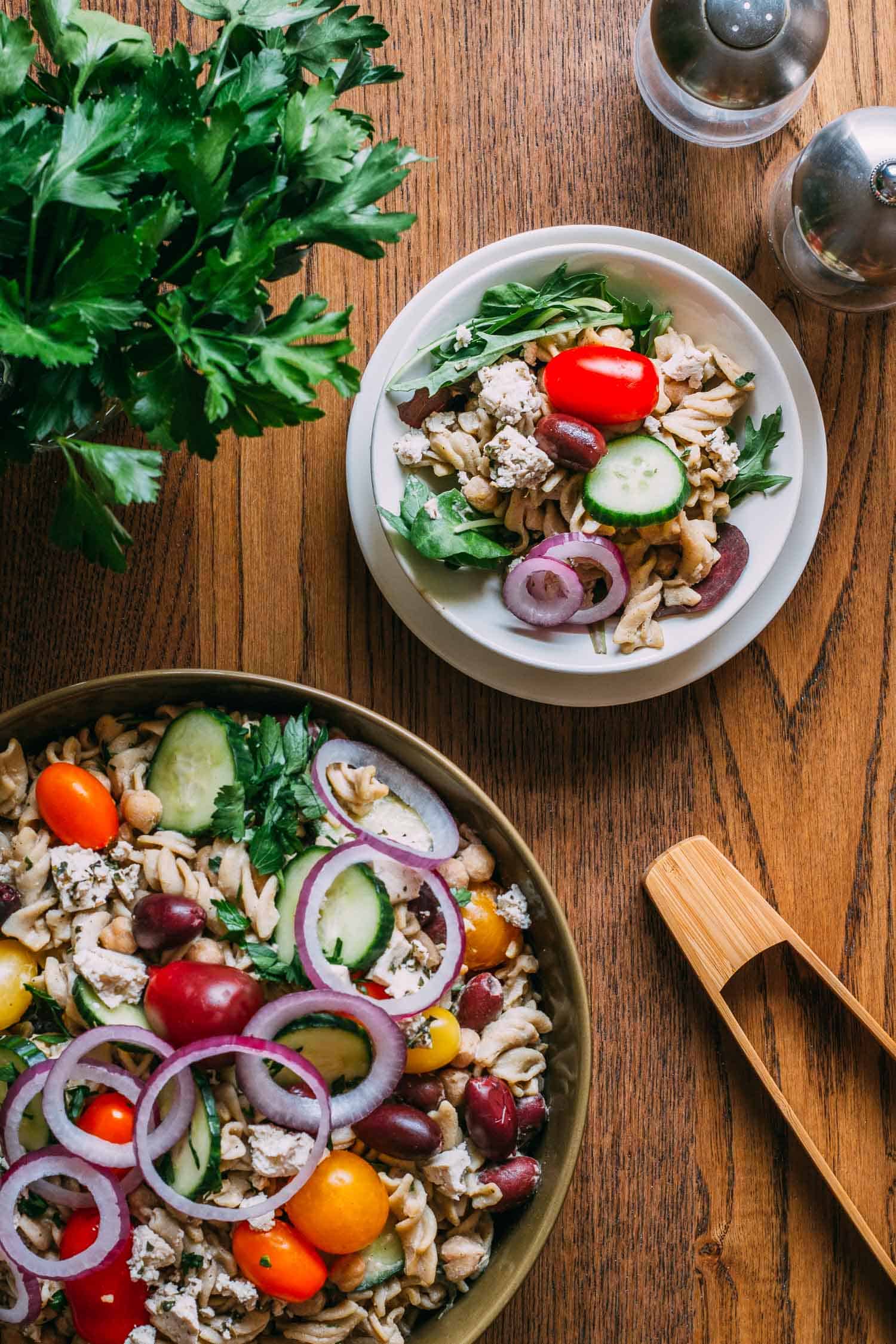 Vegan Greek pasta salad in two bowls.