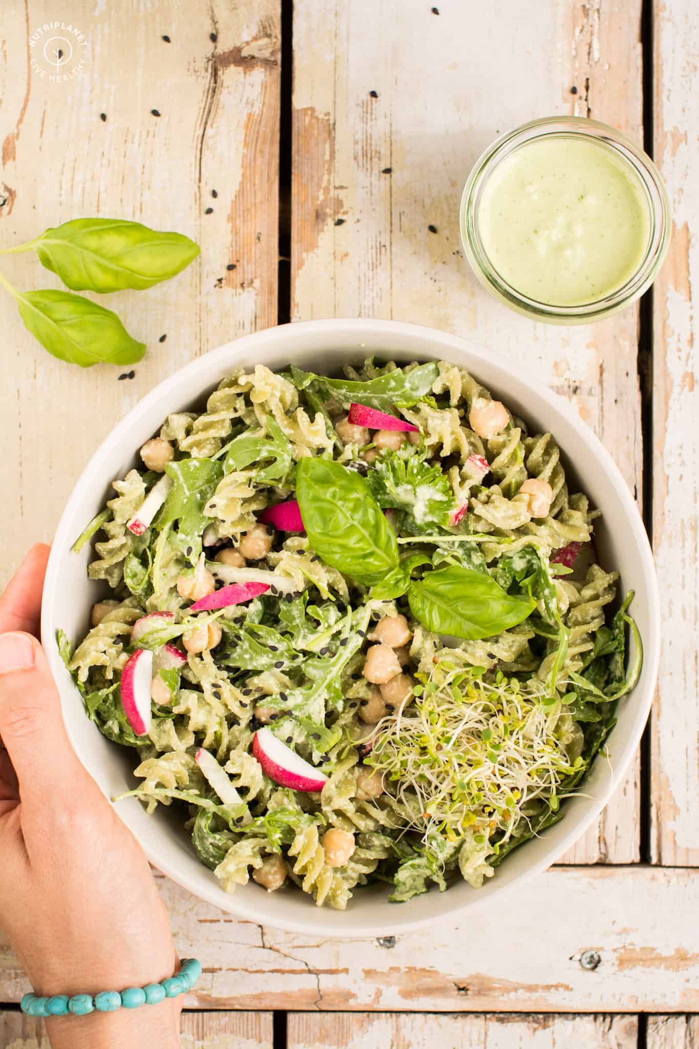 Vegan basil pesto pasta in a bowl.