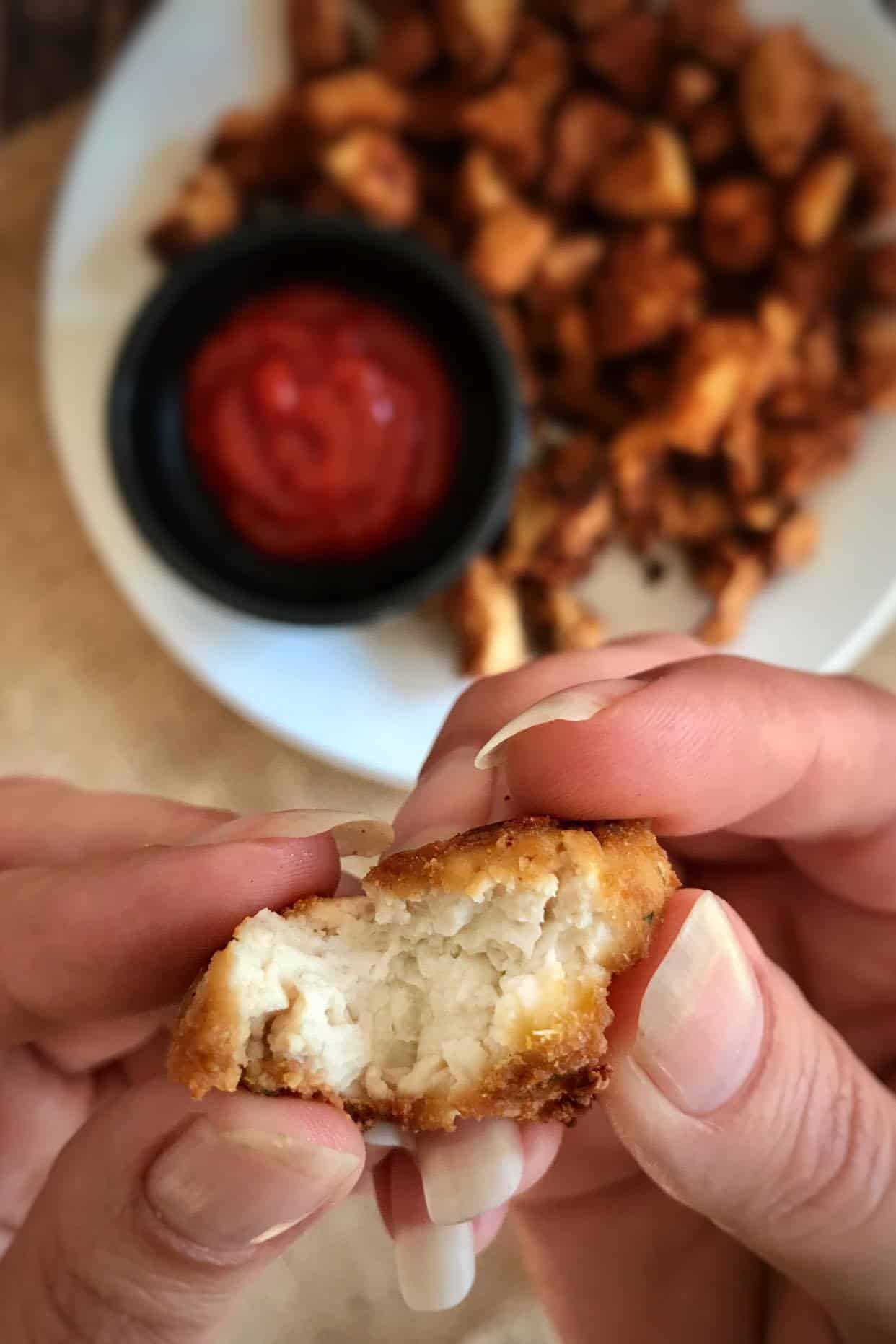 Closeup of the inside of a tofu nugget.