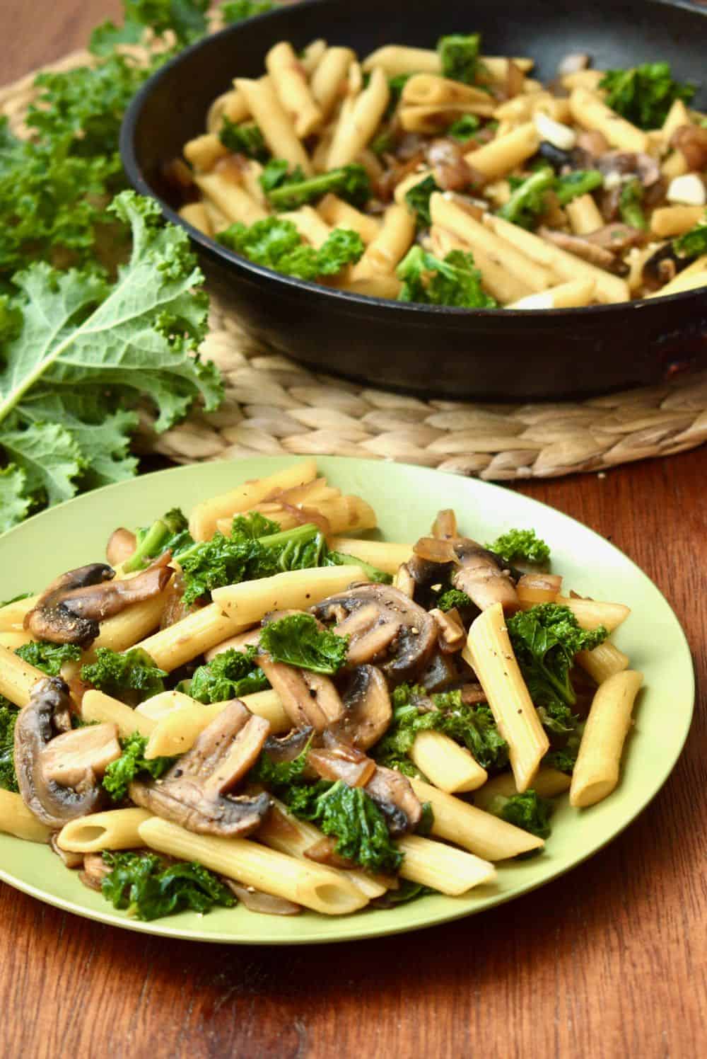 Vegan kale mushroom pasta in a bowl.