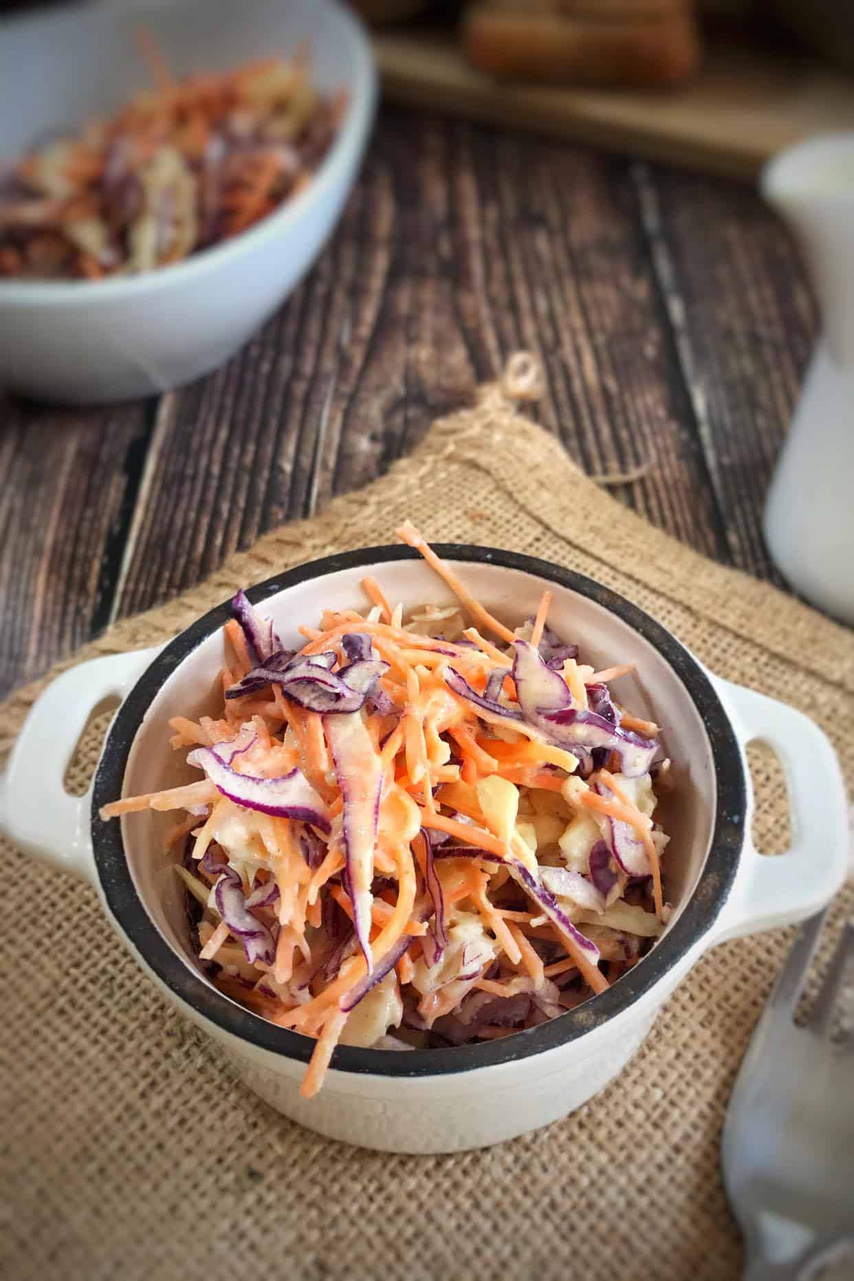 Vegan creamy coleslaw in a bowl.