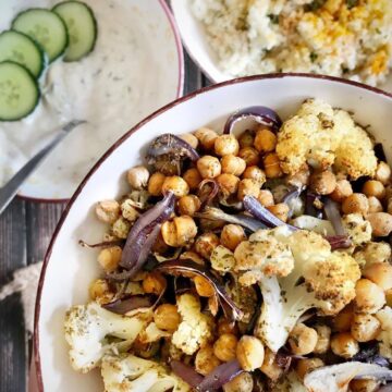 Sheet pan cauliflower and chickpeas in a bowl.