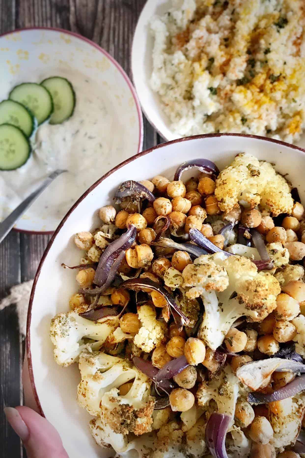 Roasted cauliflower and chickpeas in a bowl.