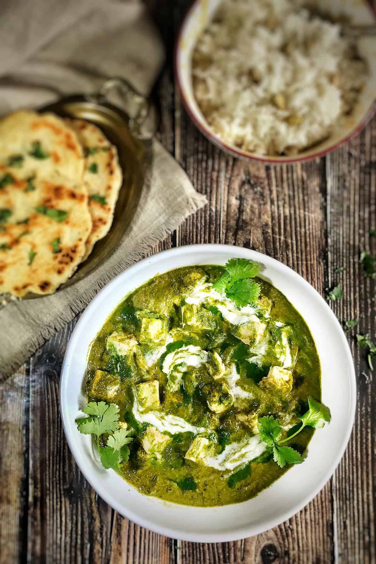 Bowl of vegan palak paneer.