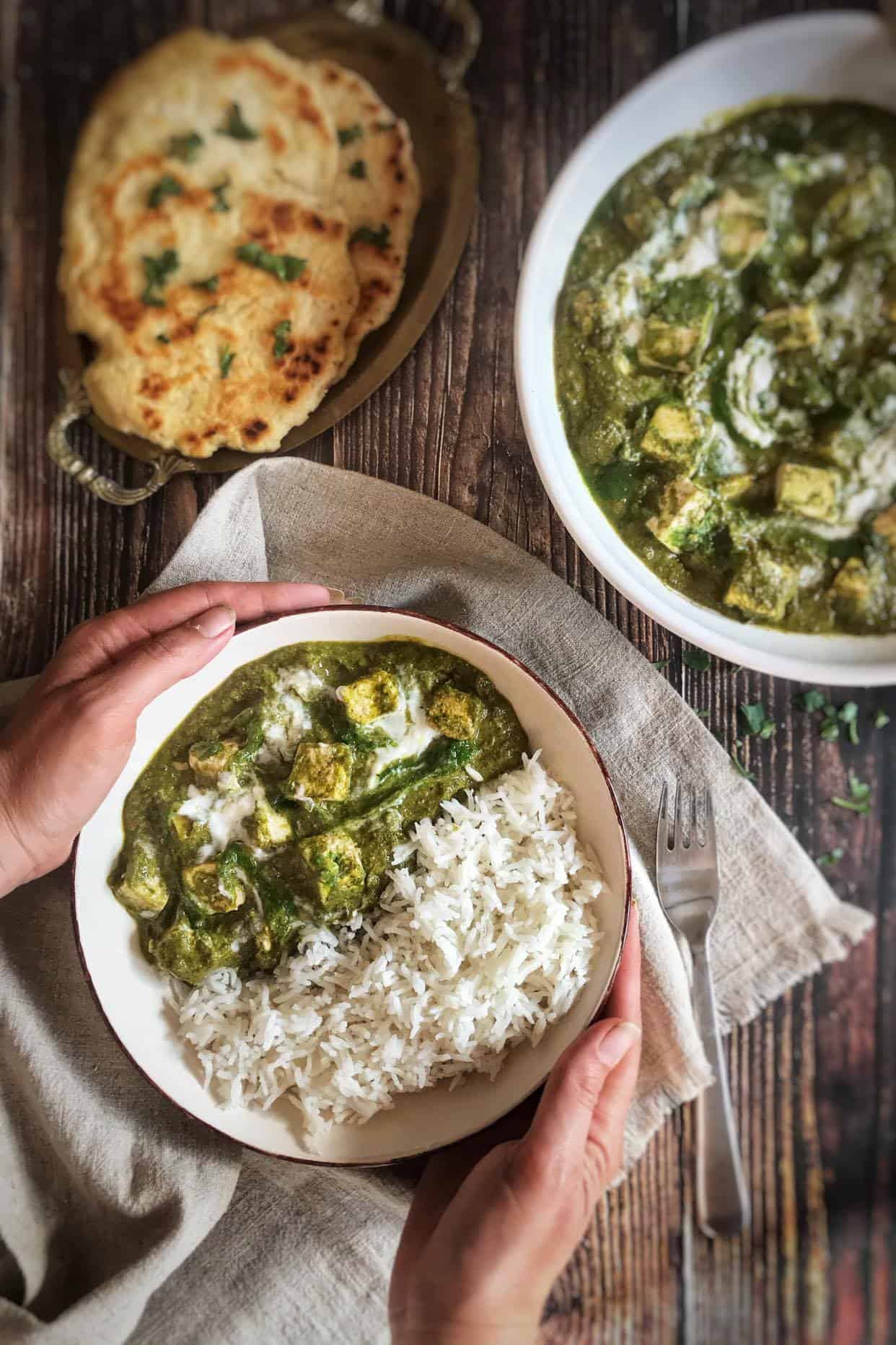 Vegan palak paneer in a bowl with rice.