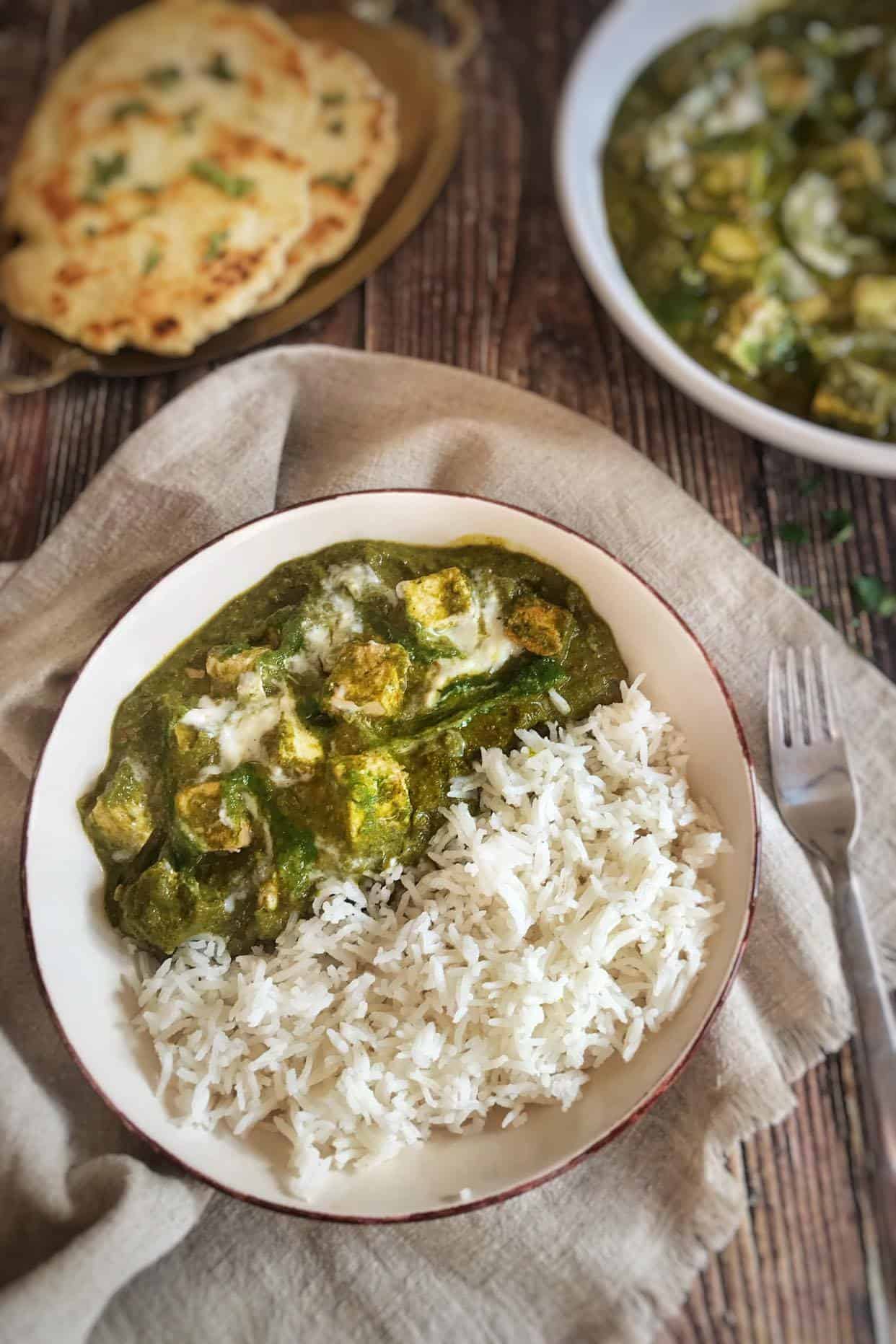 Bowl of vegan palak paneer.