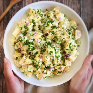 Bowl of creamy vegan potato salad.