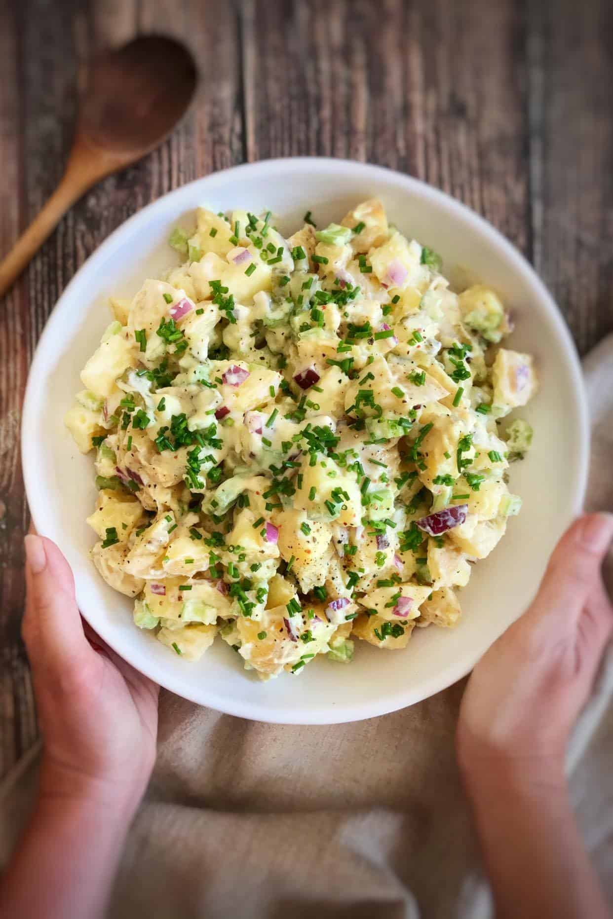 Bowl of creamy vegan potato salad.