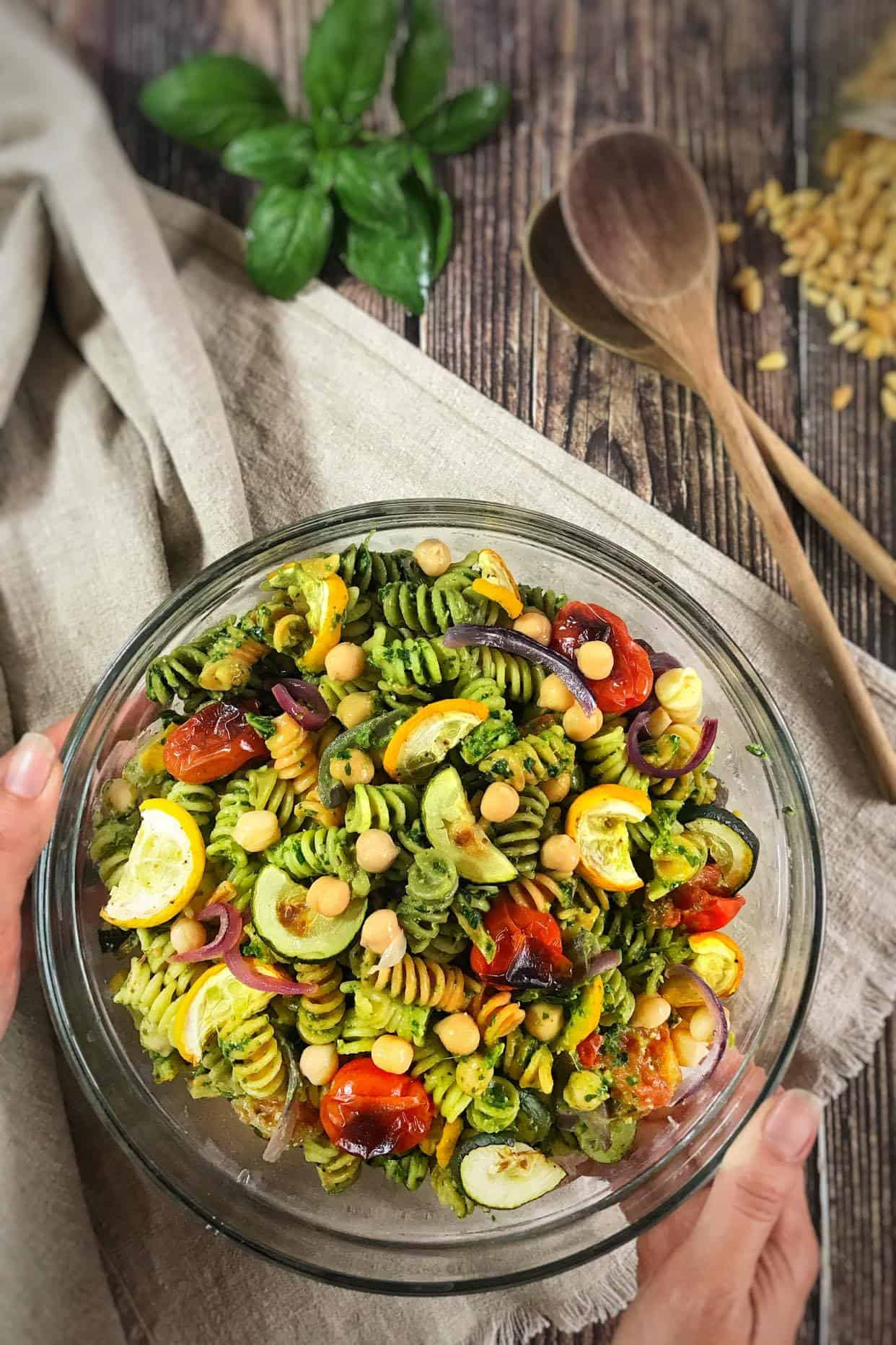 Vegan pesto pasta salad in a bowl.