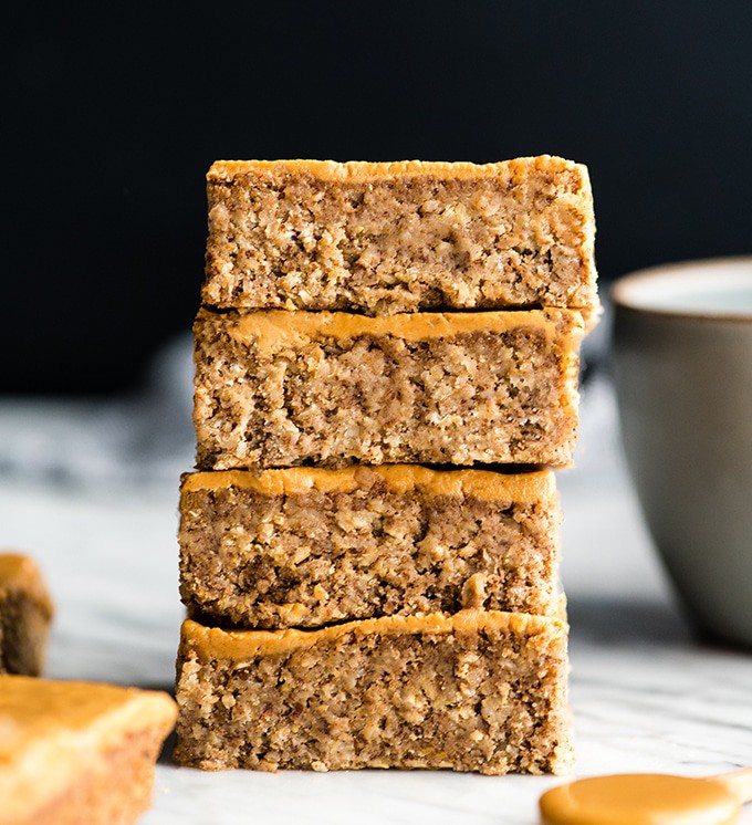 Stack of vegan peanut butter oatmeal breakfast bars.