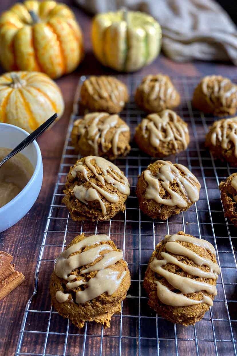 Vegan pumpkin cookies on a drying rack.