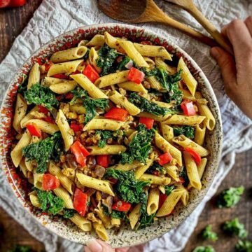 Vegan kale penne pasta in a bowl.