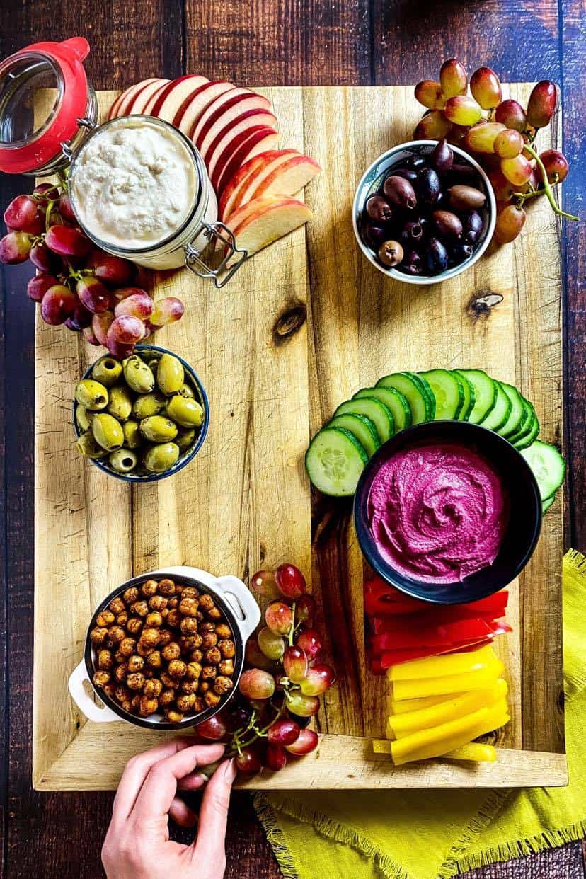 Fruit and veggies added to a vegan charcuterie board.