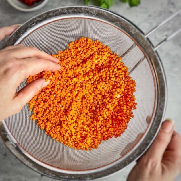 Lentils in a colander. 