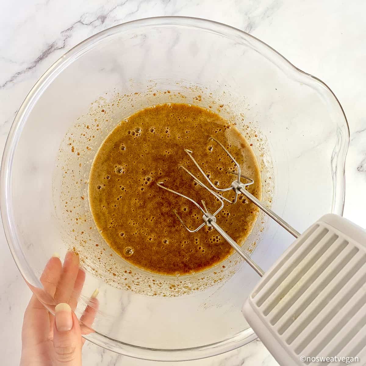Mix the wet ingredients with a hand mixer.