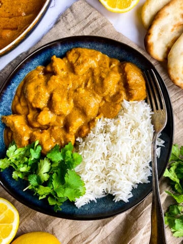 Vegan butter chicken in a bowl with rice.