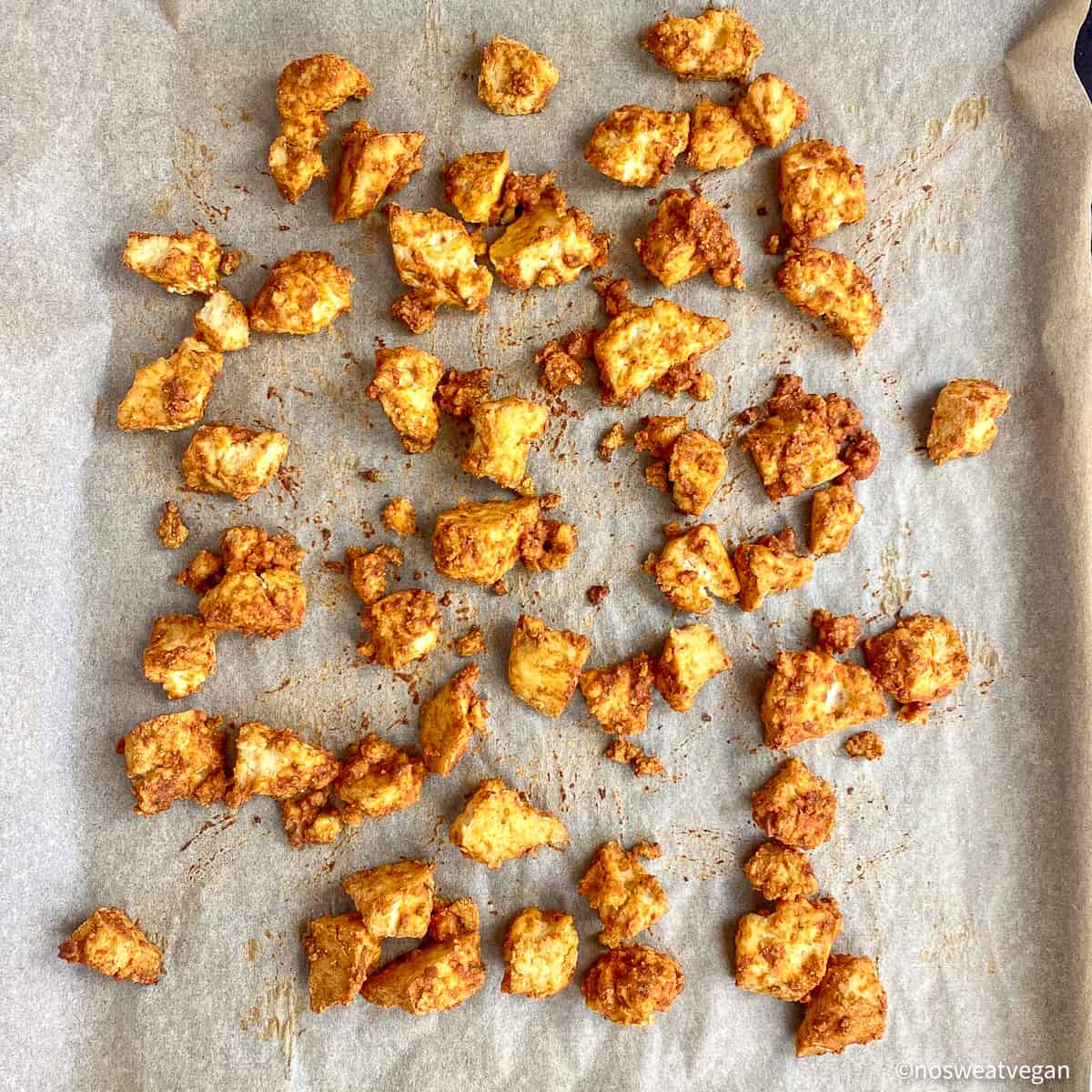 Tandoori tofu on sheet pan.