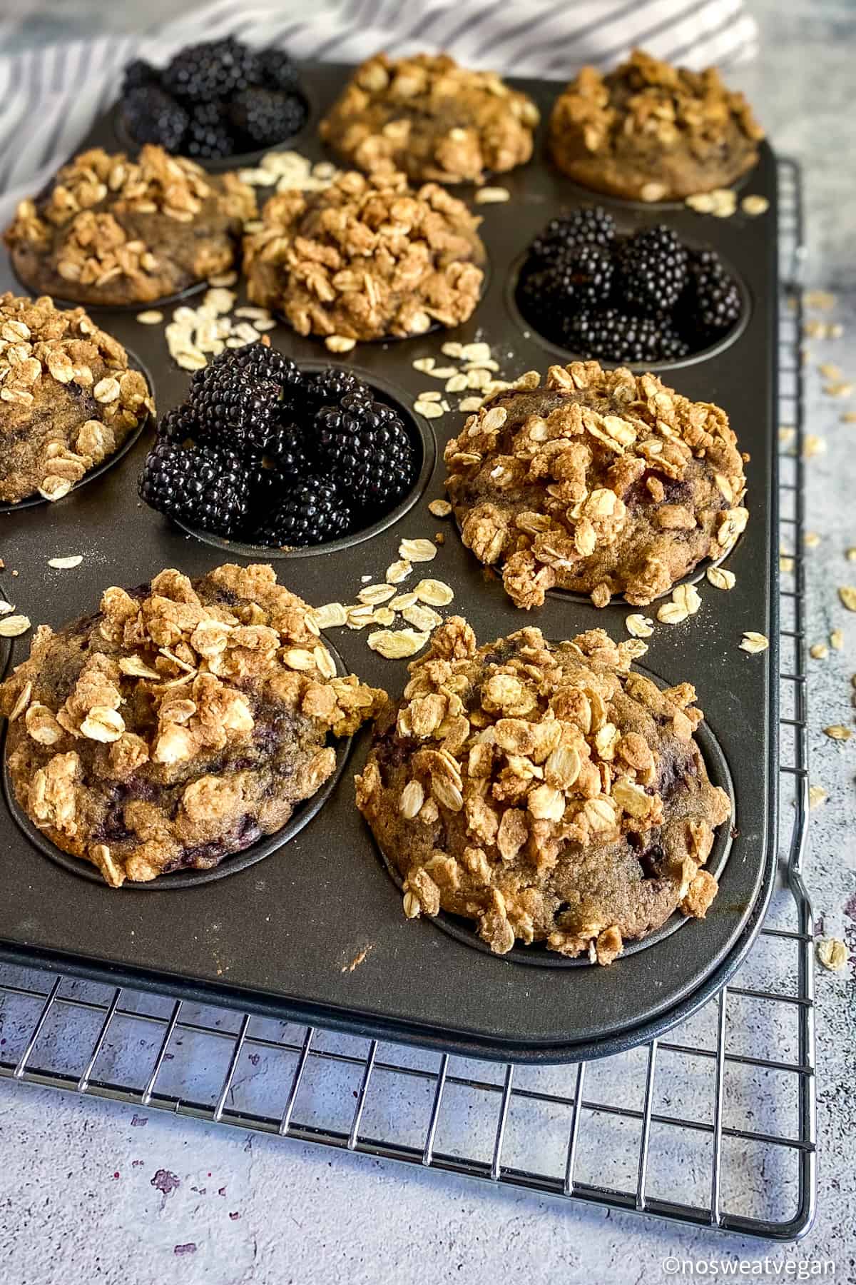 Blackberry muffins in pan.