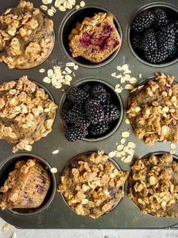 Vegan blackberry muffins in pan.