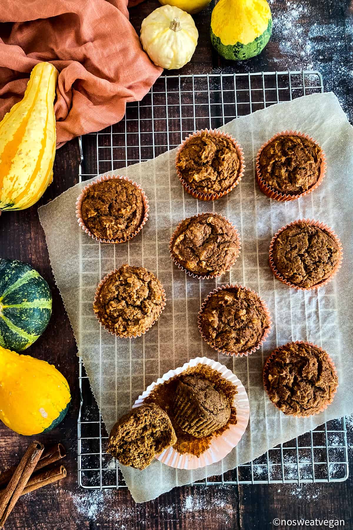 Pumpkin muffins on a cooling rack.