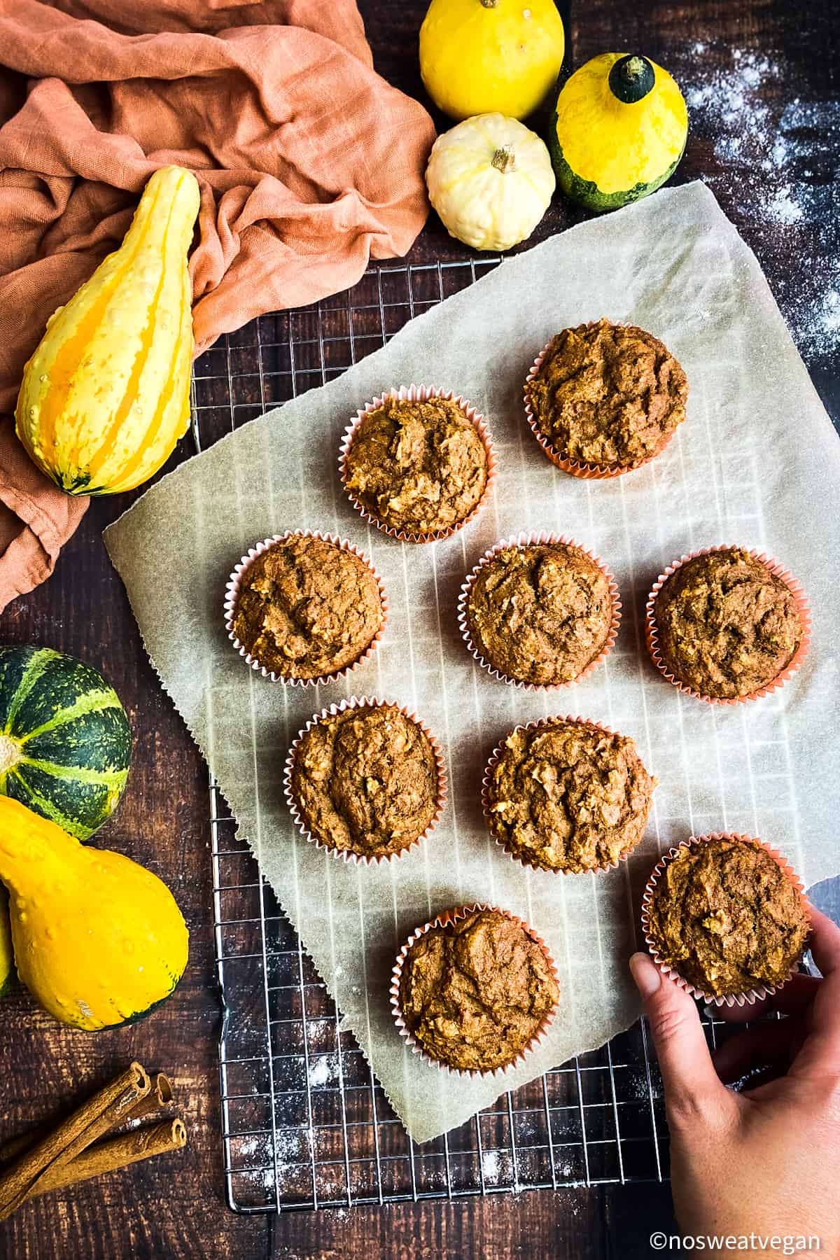 Healthy pumpkin muffins on drying rack.