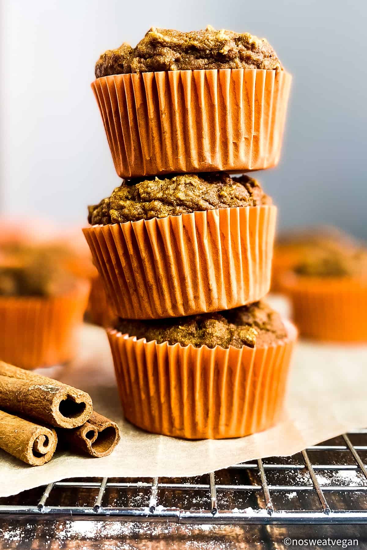 Vegan pumpkin muffins, stacked.