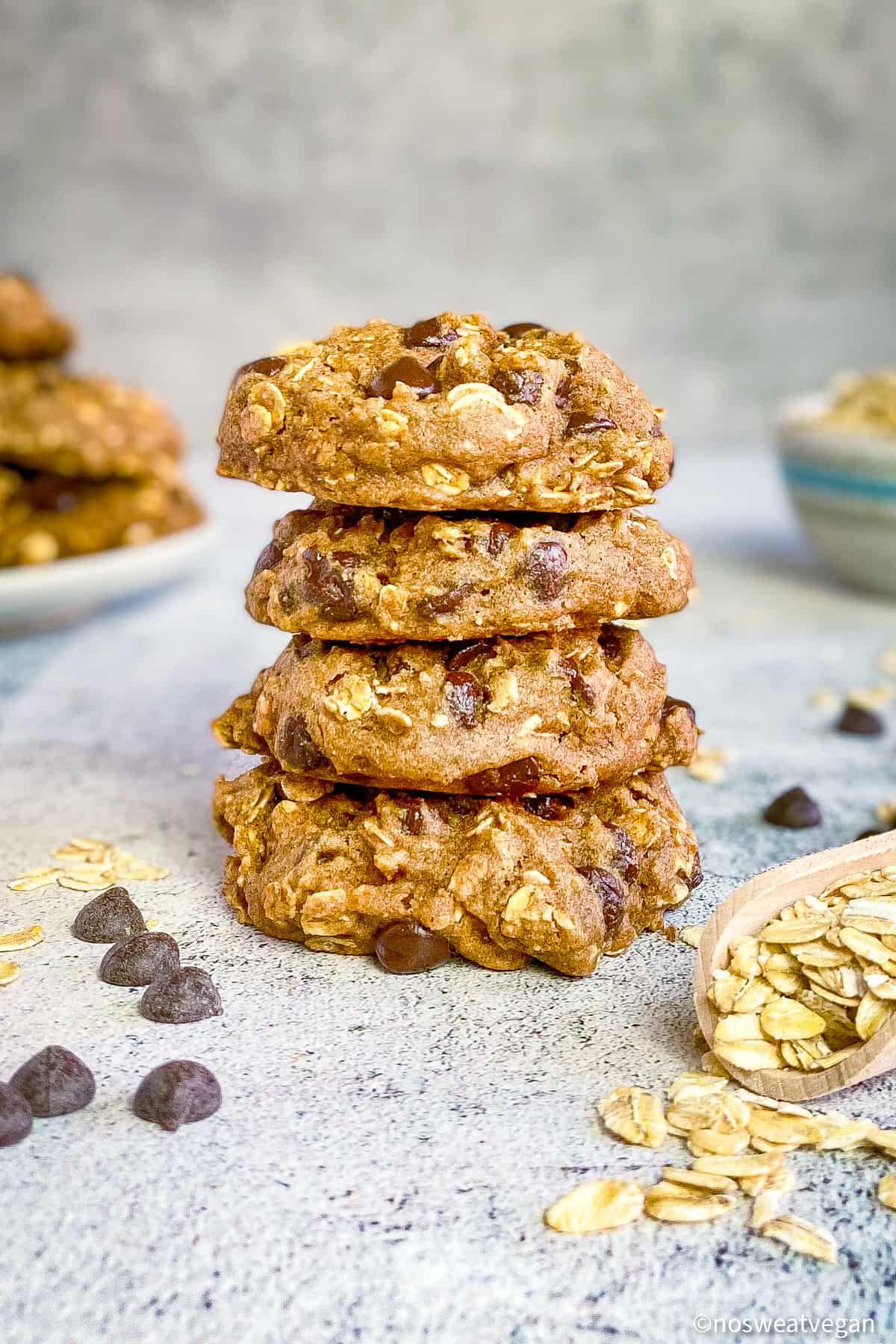 Vegan oatmeal chocolate chip cookies stacked.