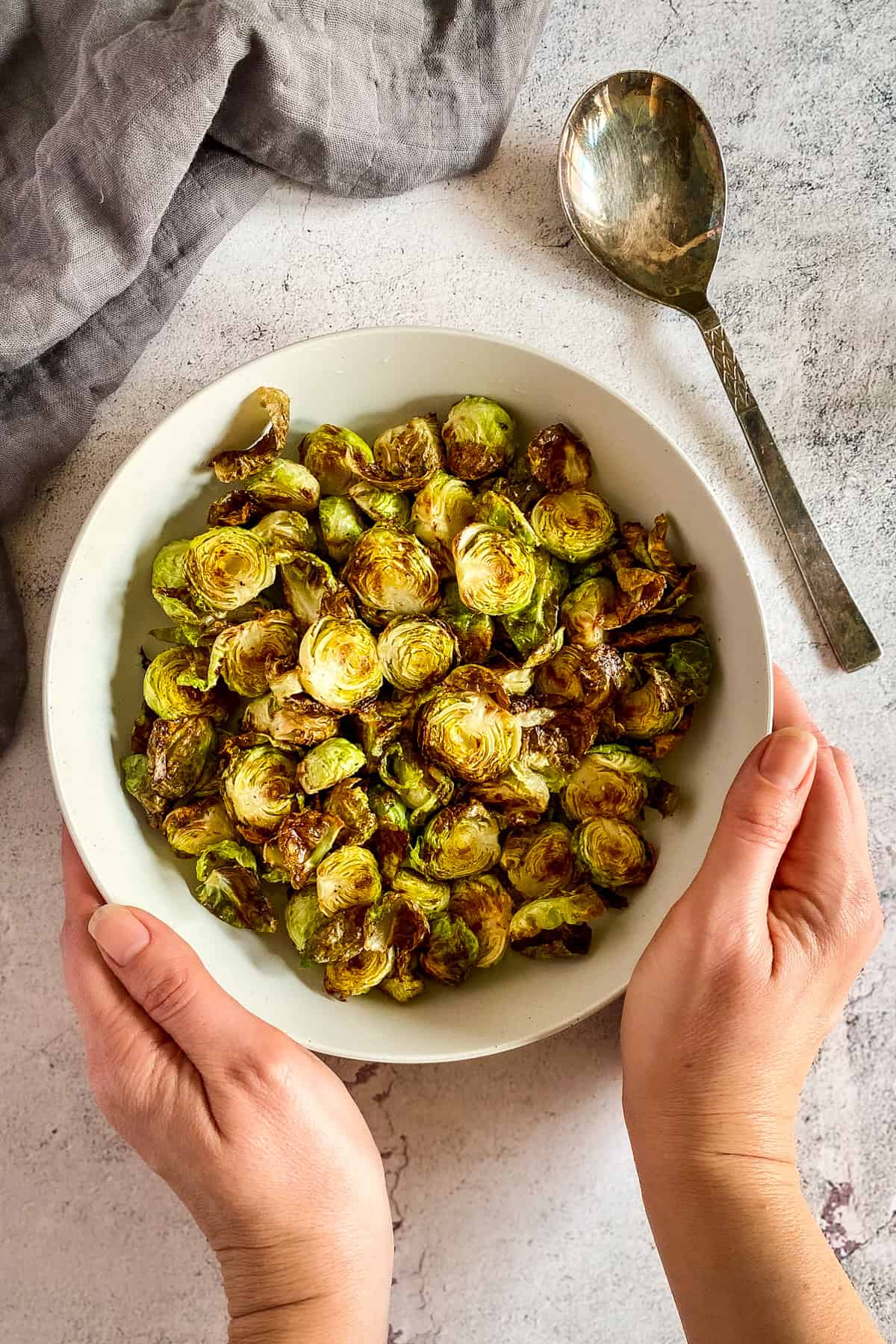 Air fryer Brussels sprouts in a bowl.