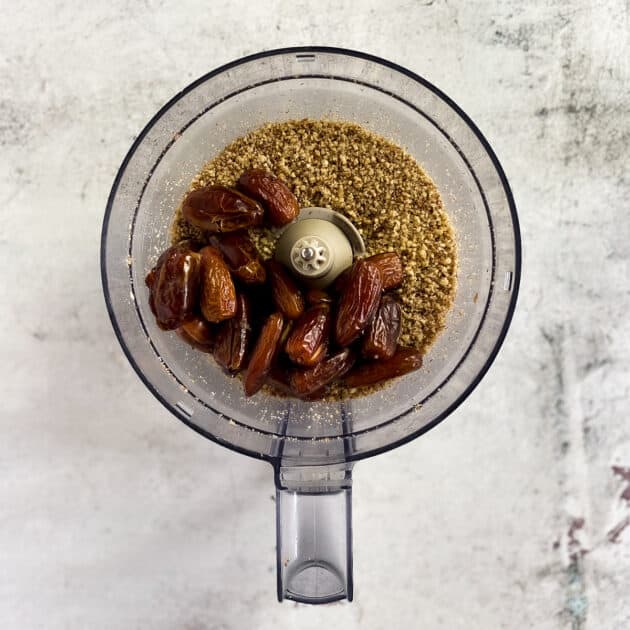 Blend walnuts, pecans, and dates.