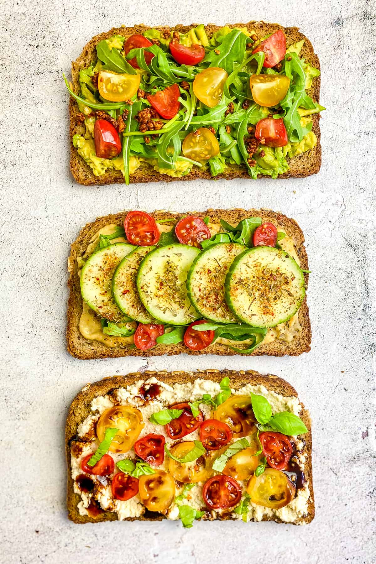 3 toasts with savory toppings.