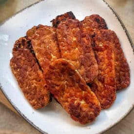 Tempeh bacon on plate.