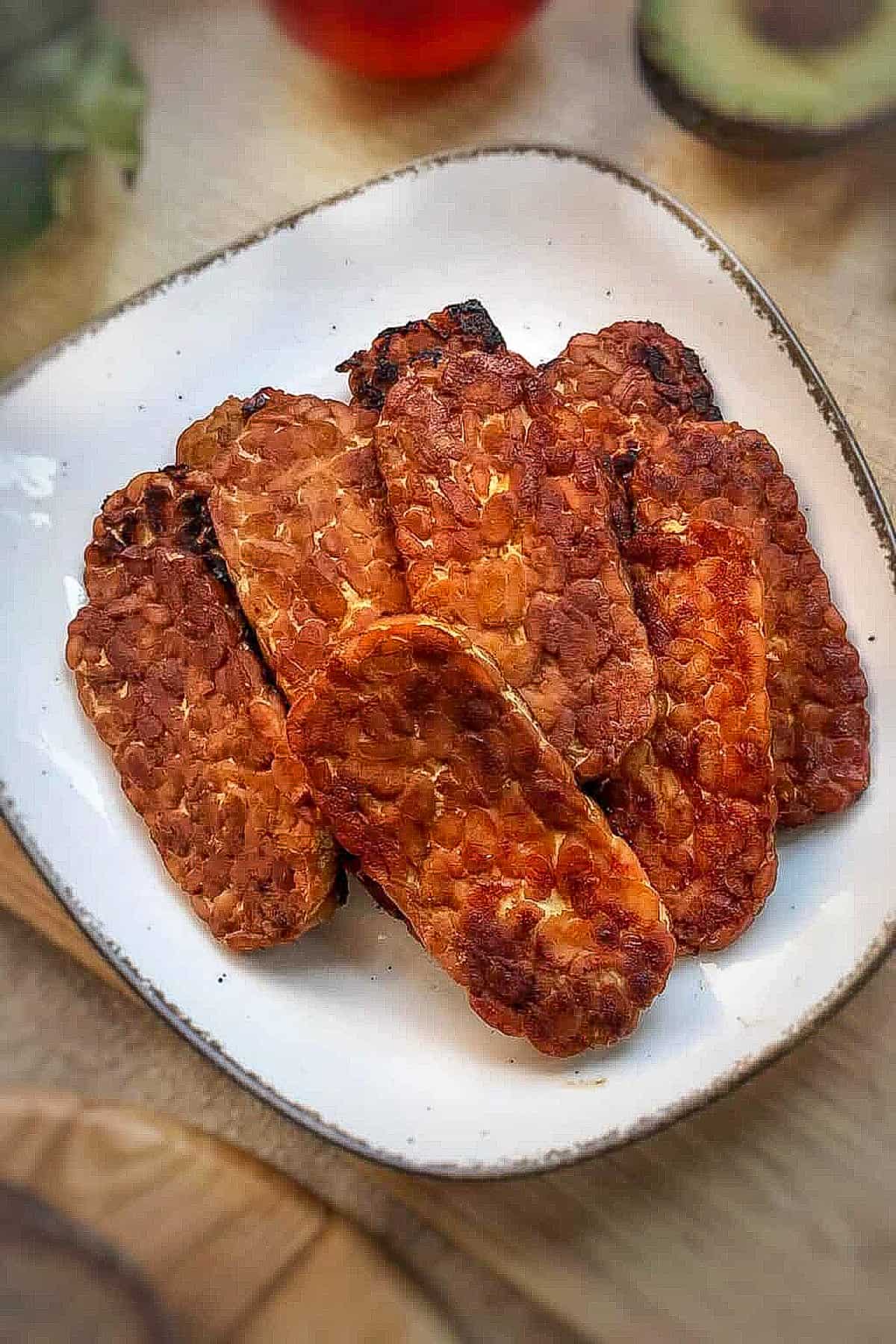 Tempeh bacon on plate.