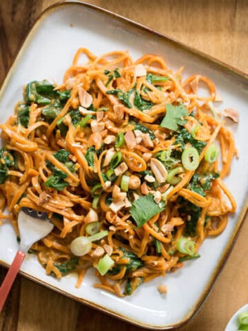 Peanut sweet potato noodles with spinach.