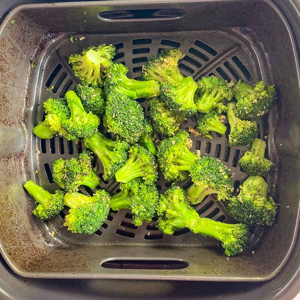 Cooking frozen broccoli in the air fryer.