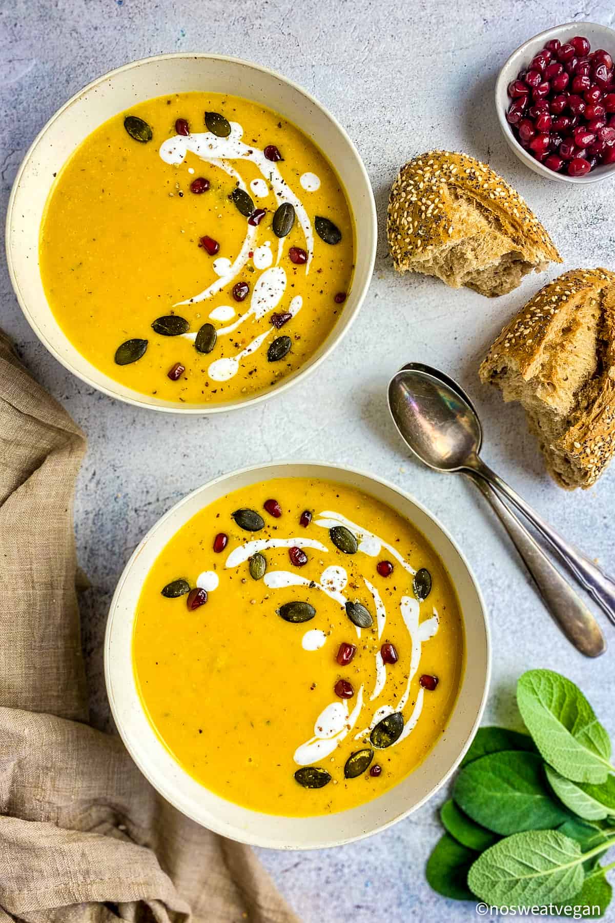 Vegan butternut squash soup in two bowls.