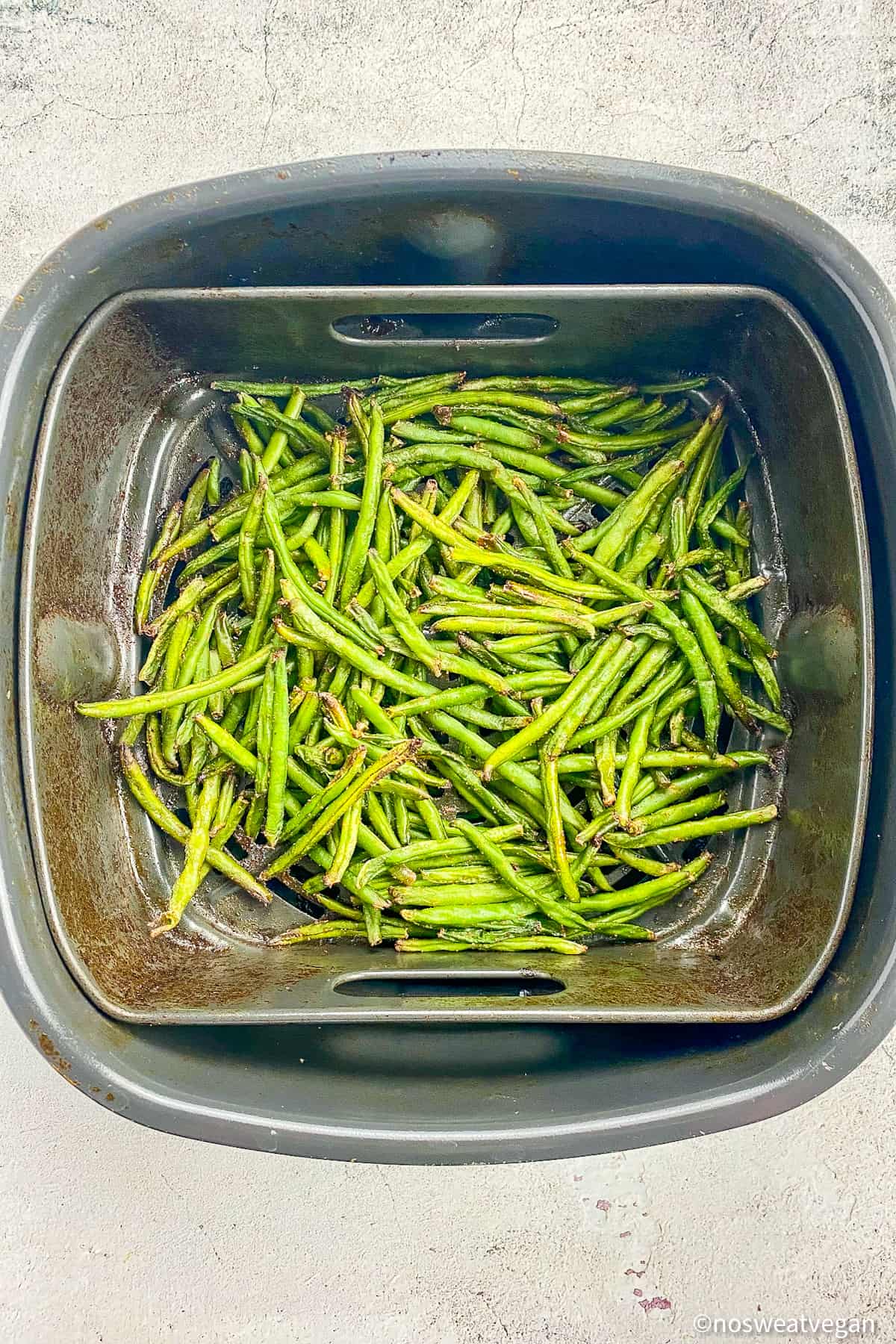 Frozen green beans roasted in air fryer.