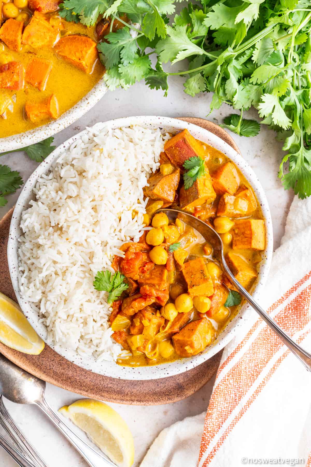 Bowl with rice and chickpea sweet potato curry.