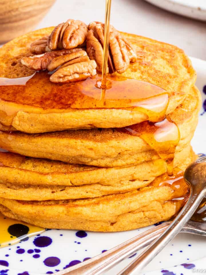 Vegan sweet potato pancakes on a plate.