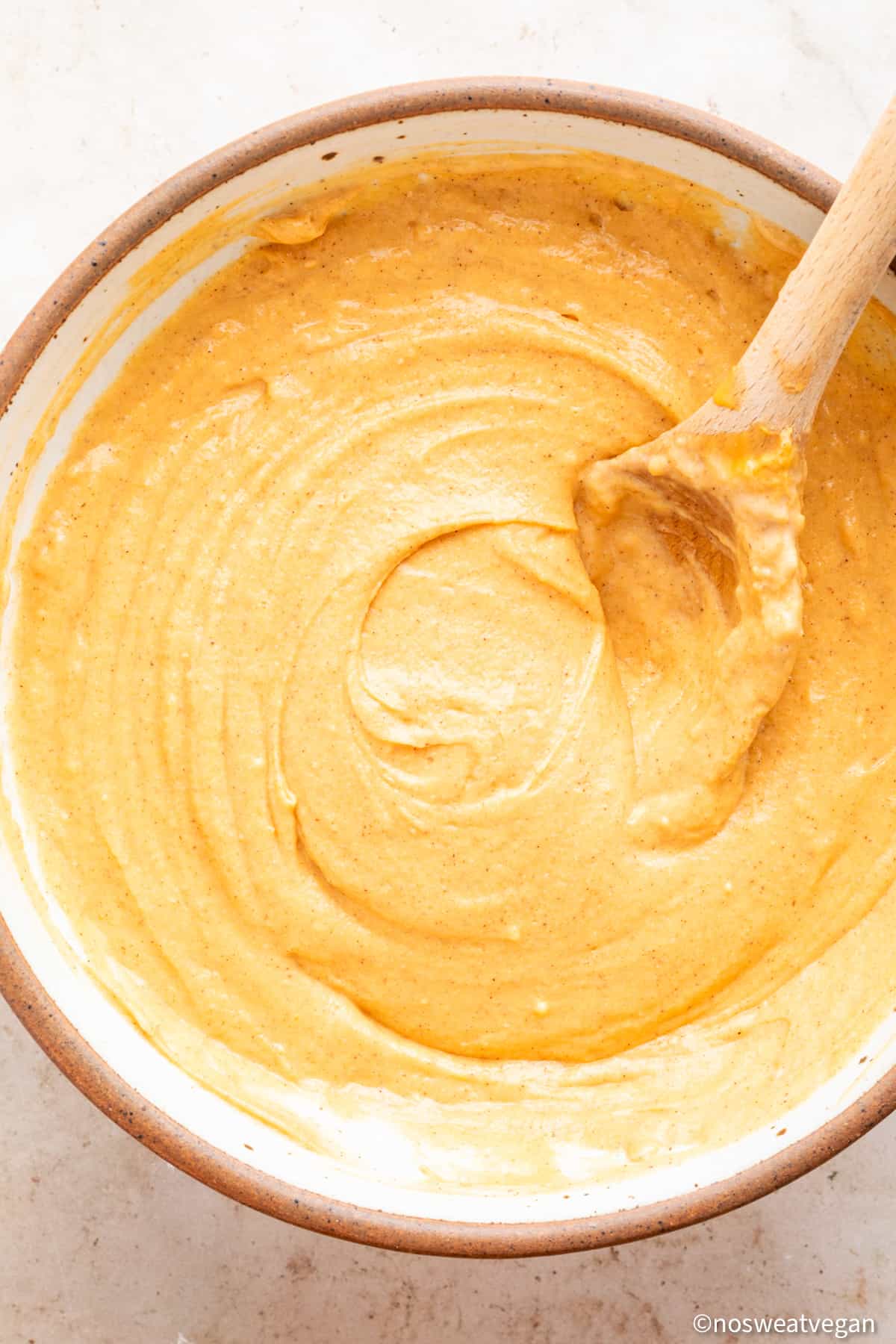 Vegan sweet potato pancake batter in a bowl.