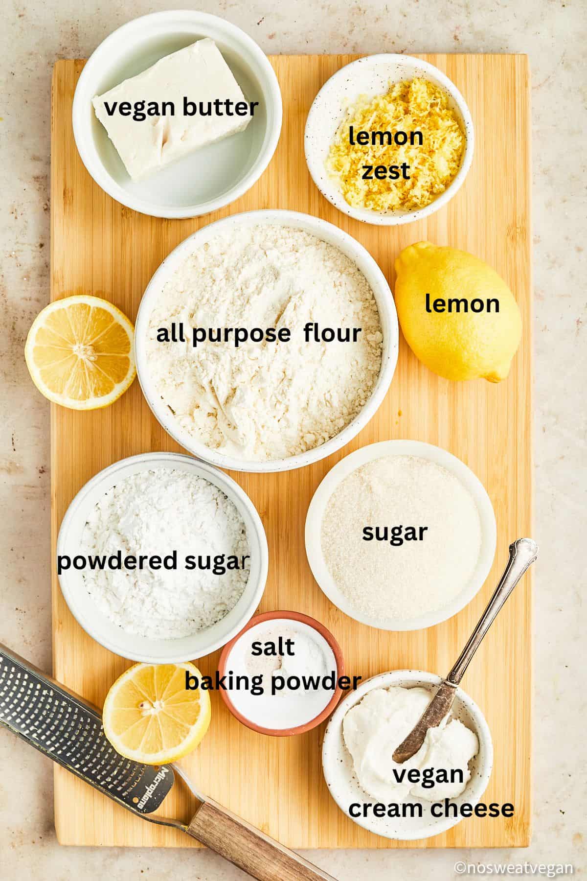 Vegan lemon cookie ingredients on a cutting board.