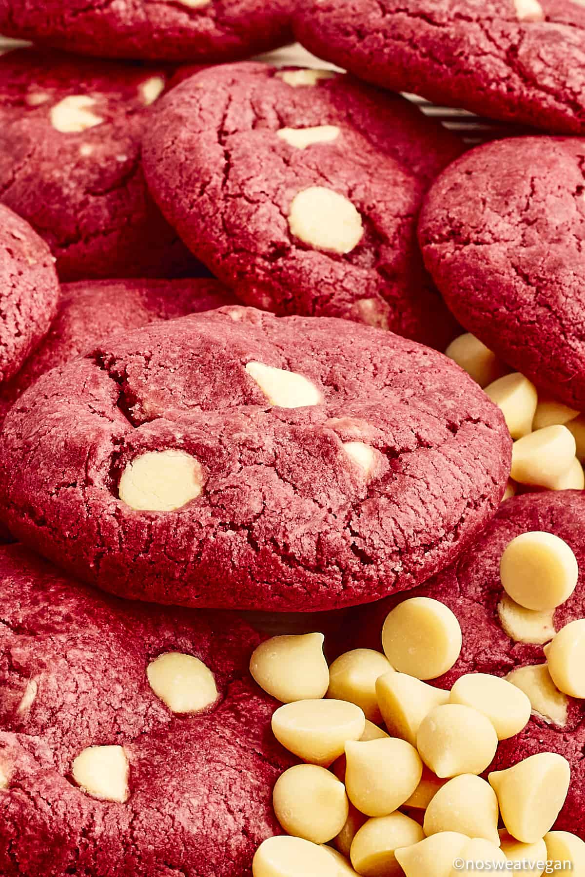 Vegan red velvet cookies closeup with white chocolate chips.