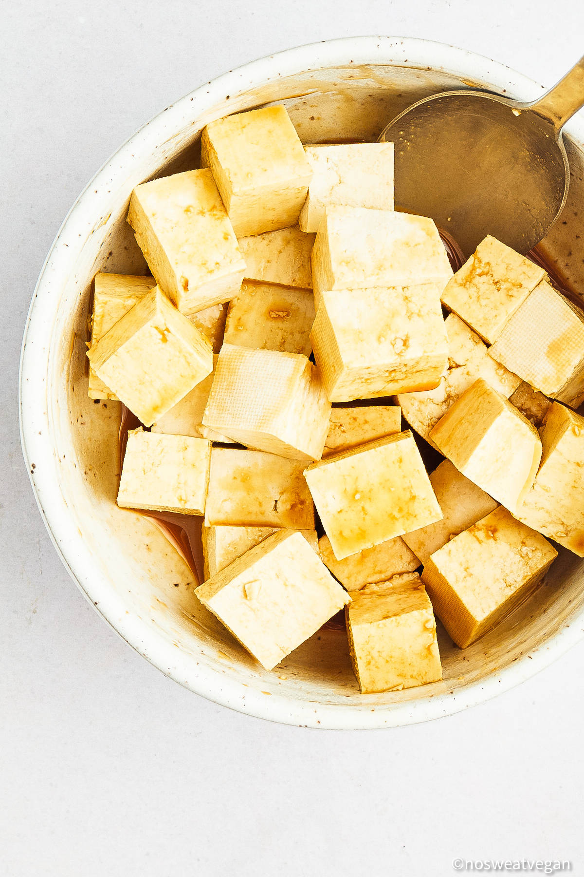 Marinated tofu in a bowl.