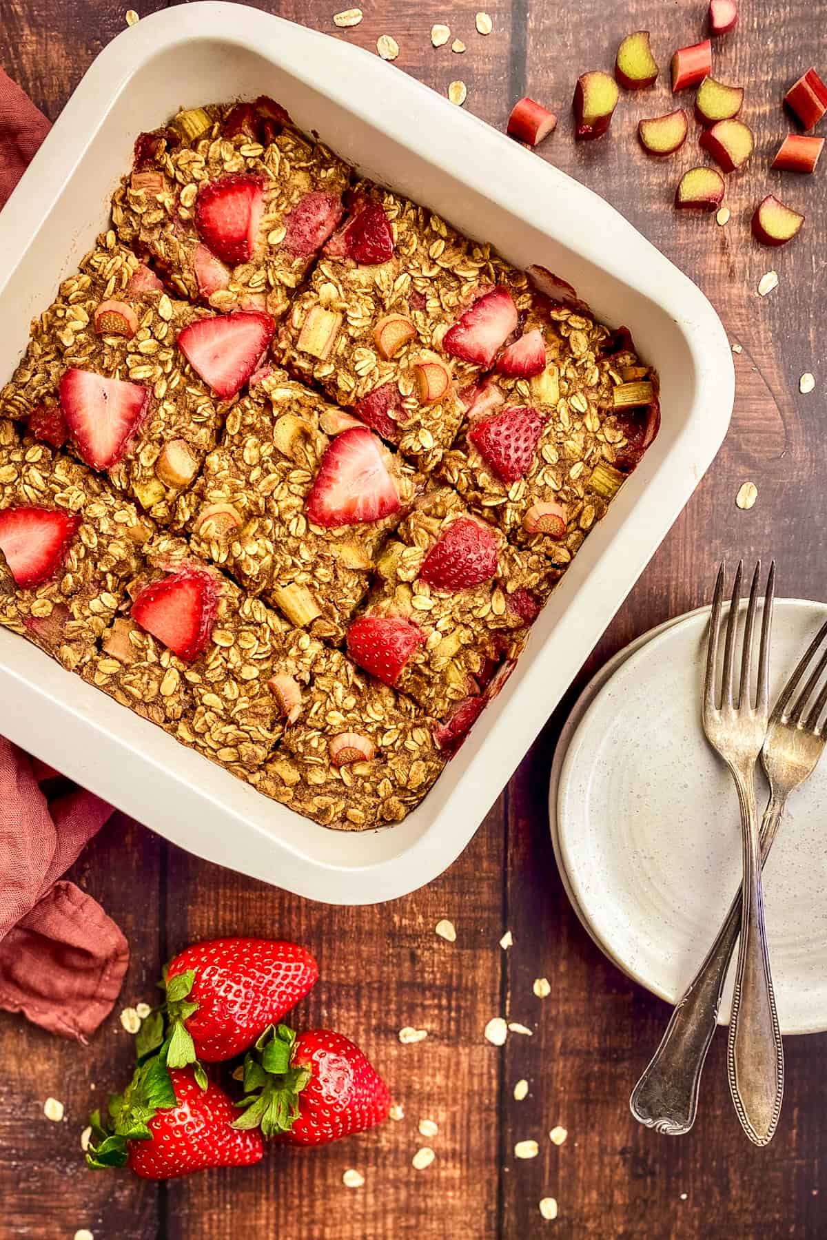 Vegan strawberry rhubarb baked oats in a baking dish.