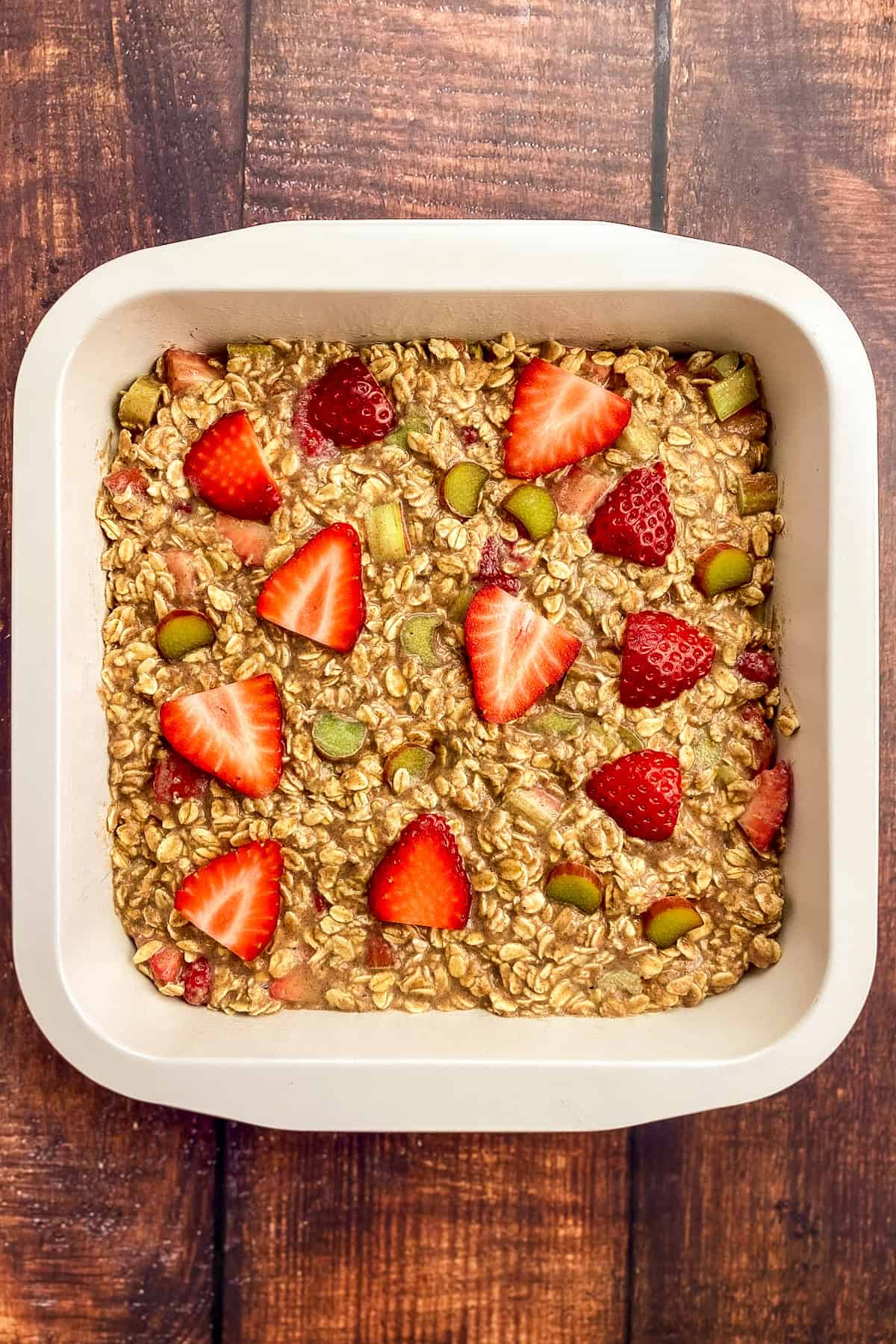 Strawberry rhubarb baked oatmeal in a baking dish.