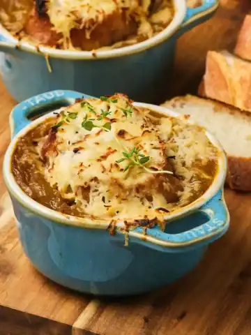 Vegan French onion soup in a bowl.